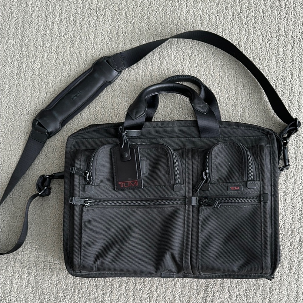 Tumi Black Briefcase with Durable Nylon and Adjustable Strap